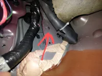 water drips down from driver side not the hood cable.webp