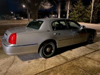 Town Car all cleaned up at night.webp